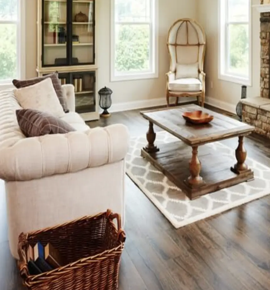 Model Living room with clean light furniture and wood accents